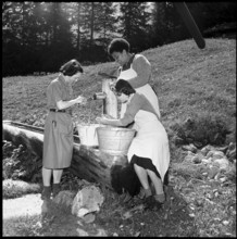 Girl scouts washing vegetables at the fountain, 1952.