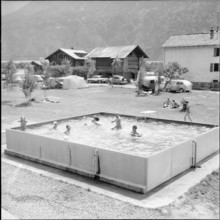 Camping Brigerbad, children playing in pool; 1959.