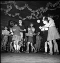 La Forclaz; people celebrating the national holiday, children dancing; 1953.