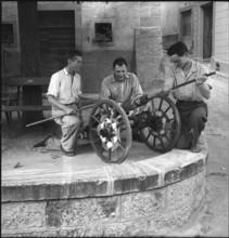 The population of a winegrower village prepares the national holiday celebration.