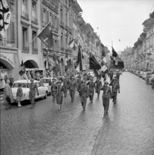 Military parade through the old town, Berne 1957.