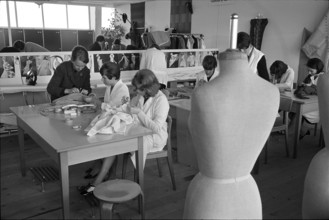Women working in a tailor's studio; 1966.