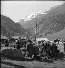 Farmers praying in the Turtmanntal valley, Switzerland, 1940.