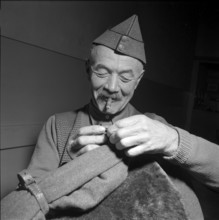 Sixty years old soldier being discharged, La Sarraz 1954.