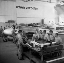 Instruction at arming, Vampire fighter jet, Buochs 1954.