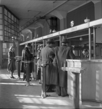 Clients at post office counter;  1943.