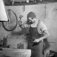 Forge, nailer making nails; 1940.