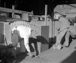 Bricklayer apprentices during their final examination.