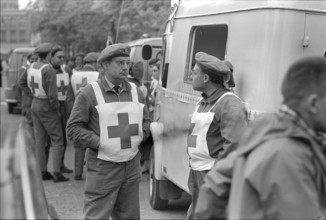 Student riots in Paris 1968: Ambulance, red cross.