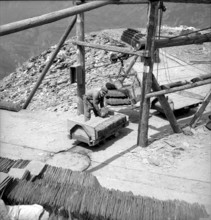 Transportation of slates, ropeway, slate mine in Termen,  Valais; 1946.