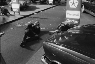 38th Geneva International Motor Show, 1968: visitor taking a picture.