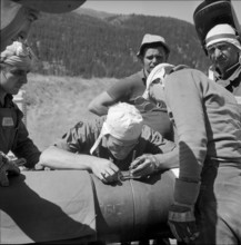 St. Pierre; workers laying a pipeline; 1962.