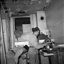 Safeguarding of devastated apartment after gas explosion, Berne 1952.