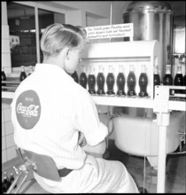 Coca-Cola, worker, bottling plant Zurich, 1950.