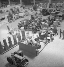 Petrol, gasoline penury, tractor, truck powered by wood gas; 1942.