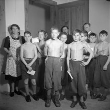Boys and adults at X-ray initiative , Neuchatel 1943.