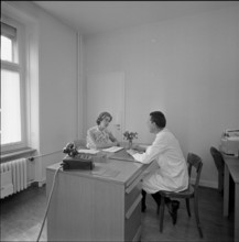 Topic: consultation, patient talking at doctor's practice 1964.