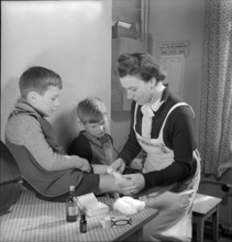 Mother and sons, 1941.