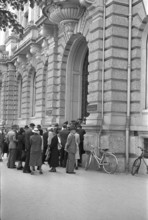 Bank run; customers rush to the bank to take out their money; 1940.