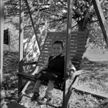 Tibetan child on swing, Unterwasser 1961.