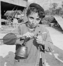 Boy carving, 1944.