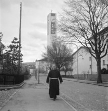 Pater Hypolite in front of Maria Lourdes church in Zurich Seebach 1951.