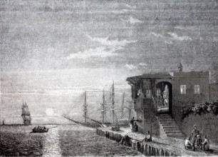 Turkish coffee house at the harbor of Rhodes in the evening.