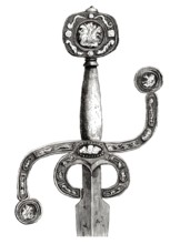 An English sword. circa 1580. with a very rare flat pommel and curved S-shaped grip. inlaid with