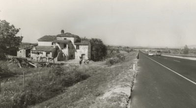 The Autostrada del Sole runs alongside Cascina Palestina near Monte San Savino.