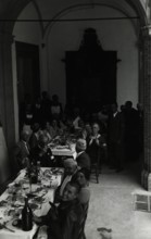Members' banquet in the cloister of Santa Maria del Monte.