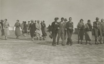 Walk along a seafront. 
	
		1924
