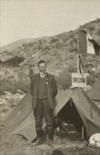 Luigi Vittorio Bertarelli in front of his tent. 1910-1920