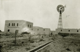 View of the Sanamalato farm in Tripolitania, with a wind turbine system for lifting.