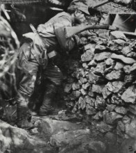 An infantryman in the trenches near Oslavia.