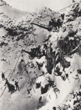 Carrying a cannon to a summit.