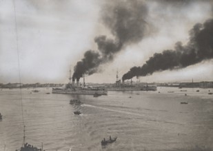 The Austrian battleships Teghetoff and Erz Franz Ferdinand enter Venice led by Italian crews.