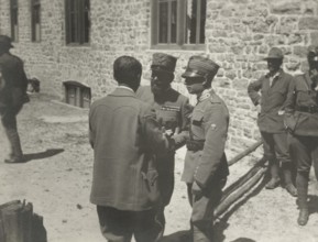 Touring Club member with two officers of the First Army.