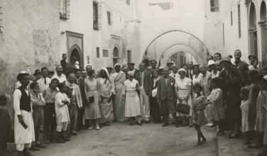 Excursionists on the streets of Tripoli. 
	
		1931