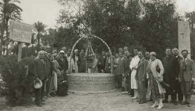 Excursionists at the well of Giama el-Turk. 
	
		1931