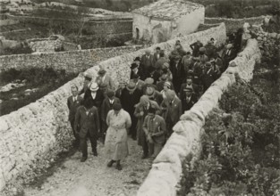 Members of the Touring Club Italiano  on the move. 
	
		1924