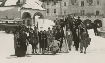 A group of skiers in front of the Cascata del Toce Hotel. 1931