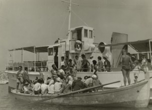 Touring Club  Members  traveling to the Tremiti Islands campsite. 1958