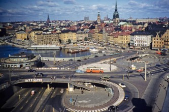 Vehicles using new road fly-over system in city centre, Stockholm, Sweden 1958 driving on the left.
