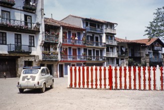 Fiat 600D car in historic area of Hondarribia or Fuenterrabia, Basque country, northern Spain, 1959