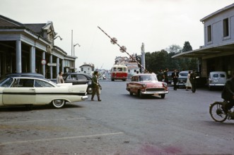 Frontier border vehicles crossing between Spain and France at Irun, northern Spain, 1959 red Opel