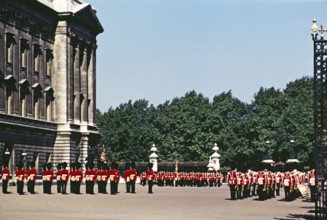 Guardsmen soliders marching, Changing of the Guard, Buckingham Palace, London, England, Uk, late