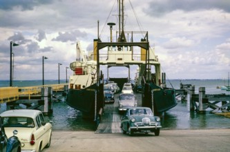 Cars disembarking ferry 'MV Camber Queen' built 1961 from Portsmouth, Fishbourne, Isle of Wight,
