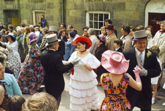 Flora Day, Helston, Cornwall, England, UK 1973 - crowds watch couples perform the  Furry dance in