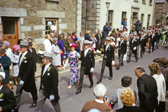 Flora Day, Helston, Cornwall, England, UK 1973 - crowds watch couples perform the  Furry dance in