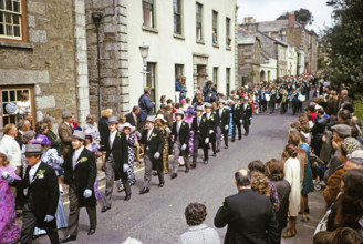 Flora Day, Helston, Cornwall, England, UK 1973 - crowds watch couples perform the  Furry dance in
